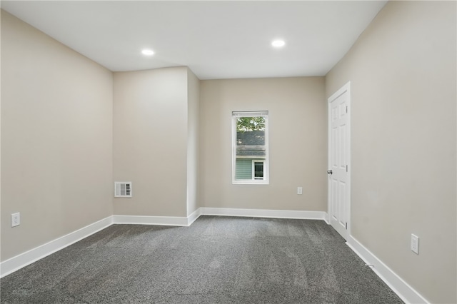 635 9th St, Freedom, PA 15042 - unfurnished room with dark colored carpet, baseboards, and recessed lighting