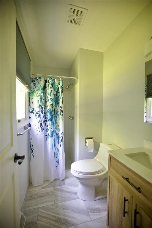 906 Arch Ave, Castle Shannon, PA 15234 - bathroom with vanity, toilet, and curtained shower