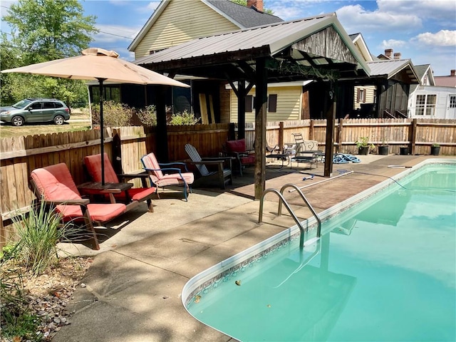 128 Main St, Perry Twp Fay, PA 15473 - rear view of house with a patio and a chimney