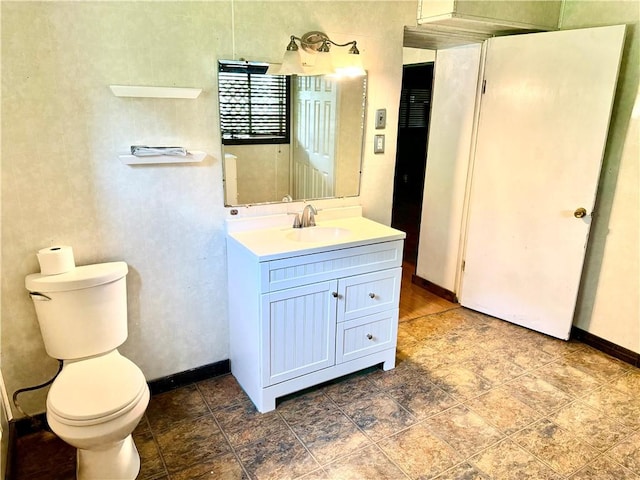 128 Main St, Perry Twp Fay, PA 15473 - bathroom featuring vanity, toilet, and baseboards