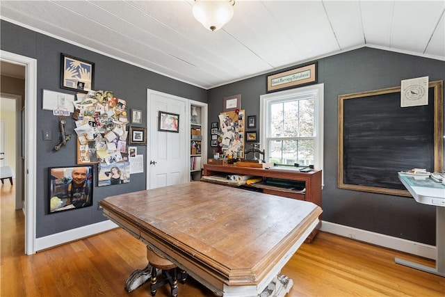 1200 River Rd, Beaver, PA 15009 - dining area with wood finished floors, baseboards, lofted ceiling, ornamental molding, and a desk