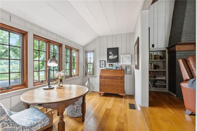 1200 River Rd, Beaver, PA 15009 - dining space with vaulted ceiling and light wood-style floors
