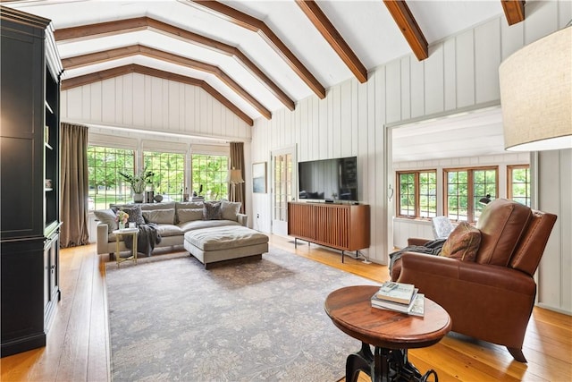 1200 River Rd, Beaver, PA 15009 - living area featuring lofted ceiling, light wood-style floors, and wooden walls