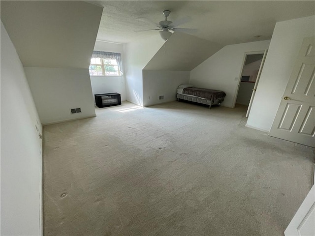 206 Saddlebrook Dr, White Twp Ind, PA 15701 - additional living space featuring carpet, vaulted ceiling, and a ceiling fan