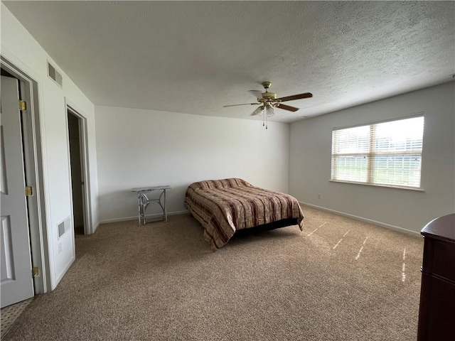 206 Saddlebrook Dr, White Twp Ind, PA 15701 - bedroom with light colored carpet, baseboards, ceiling fan, and a textured ceiling