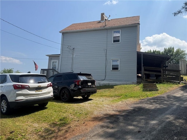 423 Lowell St, Vandergrift Wml, PA 15690 - view of side of home featuring a chimney