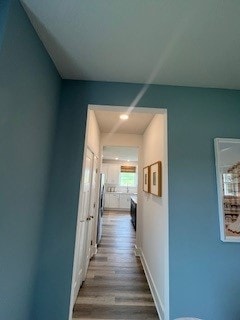 328 Stately Ct, Adams Twp, PA 16046 - hall featuring wood finished floors and baseboards