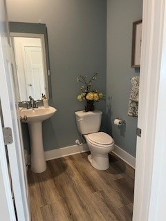 328 Stately Ct, Adams Twp, PA 16046 - half bath with toilet and wood finished floors