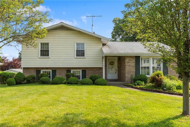 216 Bainbridge Dr, Center Twp Bea, PA 15001 - split level home with brick siding and a front lawn