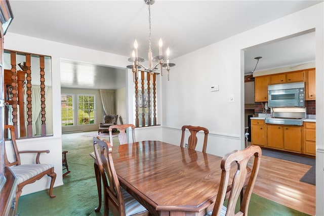 216 Bainbridge Dr, Center Twp Bea, PA 15001 - dining room with a chandelier and light colored carpet