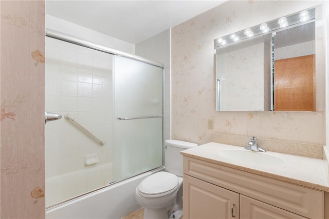 216 Bainbridge Dr, Center Twp Bea, PA 15001 - full bathroom with wallpapered walls, vanity, toilet, and bath / shower combo with glass door