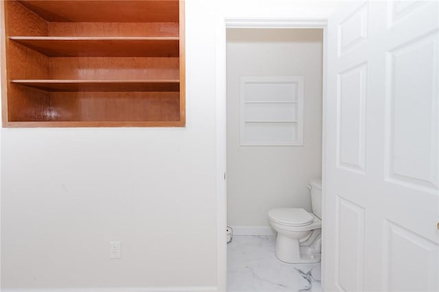 721 W Mahoning St, Punxsutawney Area School District, PA 15767 - bathroom featuring marble finish flooring, toilet, and baseboards