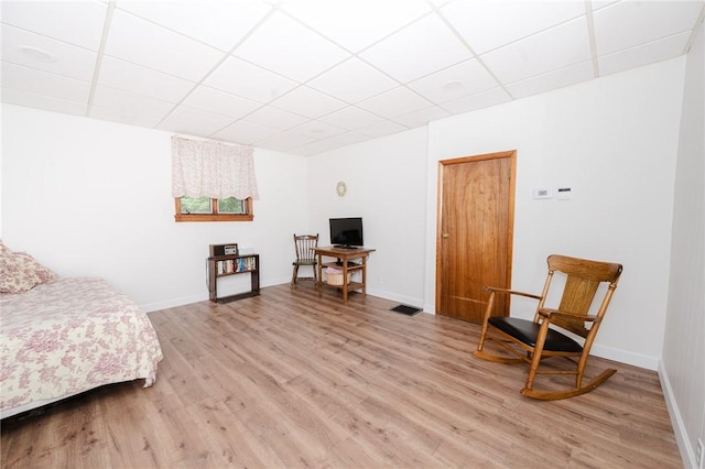 721 W Mahoning St, Punxsutawney Area School District, PA 15767 - bedroom featuring light wood-style flooring, a paneled ceiling, baseboards, and a desk