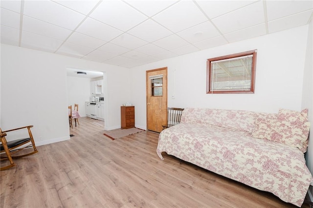 721 W Mahoning St, Punxsutawney Area School District, PA 15767 - living room with a paneled ceiling, wood finished floors, and baseboards