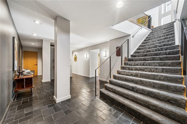 340 Lakewood Rd, Unity Twp, PA 15601 - staircase featuring recessed lighting, baseboards, and stone tile flooring