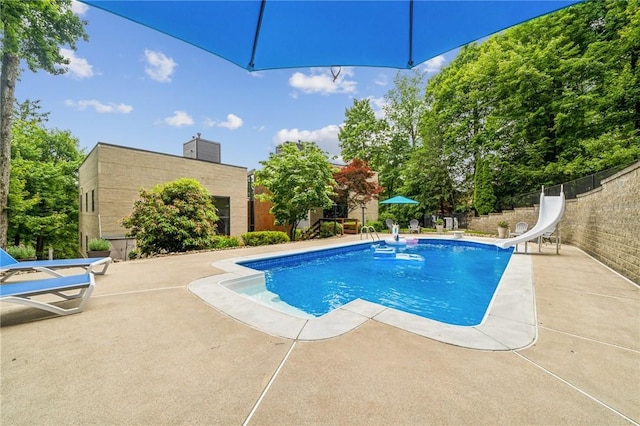 340 Lakewood Rd, Unity Twp, PA 15601 - view of pool with a water slide and a patio