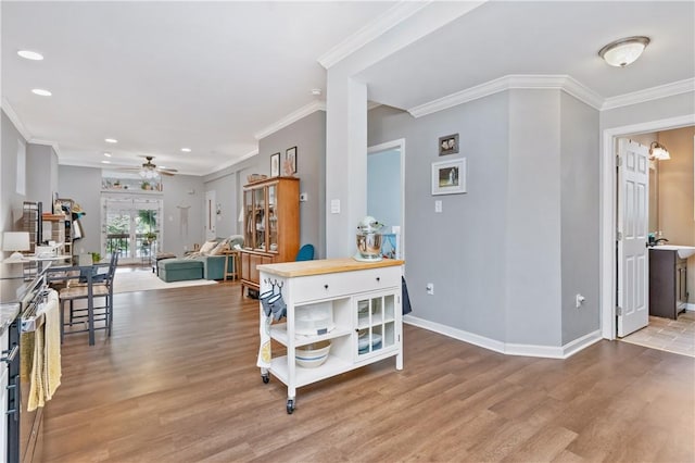 1503 Kenberma Ave, Beechview, PA 15216 - entrance foyer with light wood-style flooring, crown molding, a ceiling fan, baseboards, and recessed lighting