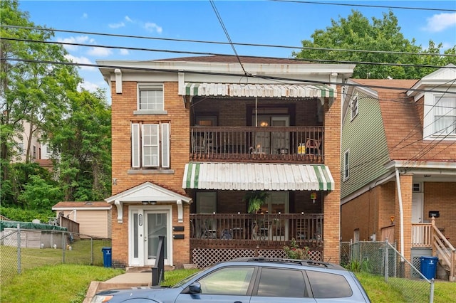 1503 Kenberma Ave, Beechview, PA 15216 - view of front of property with brick siding, a balcony, and covered porch