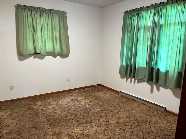 428 Muddy Creek Dr, Brady Twp But, PA 16057 - carpeted empty room with a baseboard heating unit and baseboards