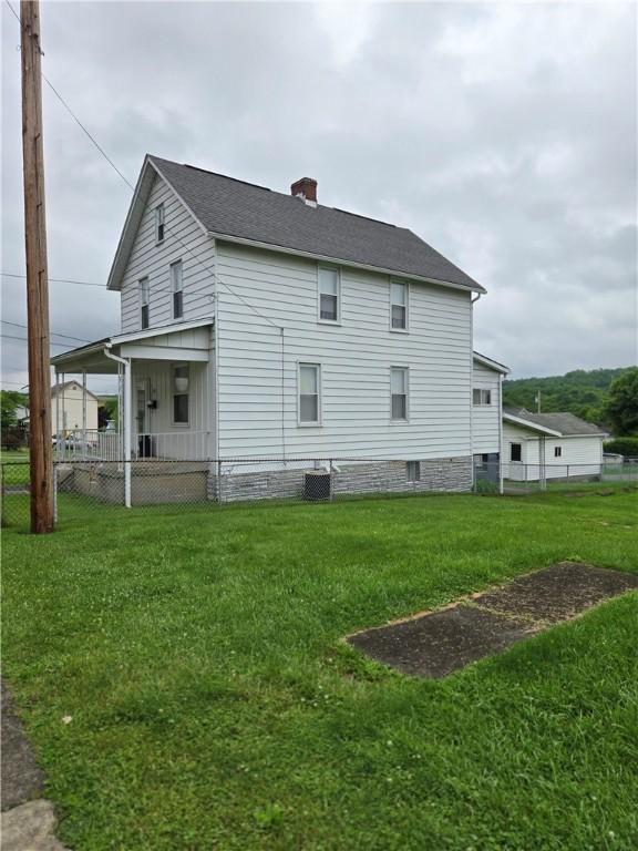 134 E Harvey Ave, Masontown, PA 15461 - view of side of property with a chimney