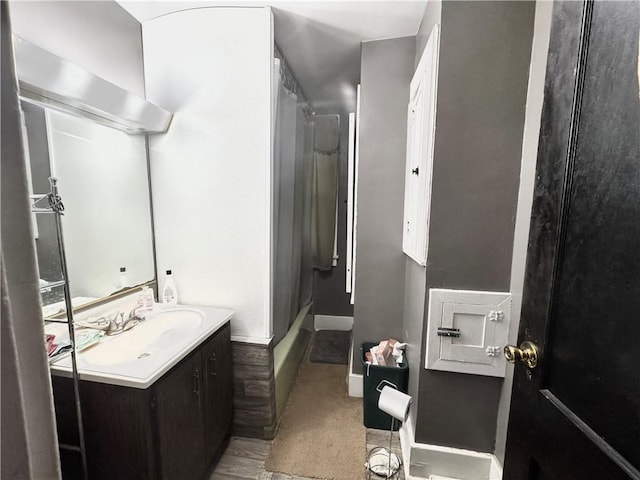 311 1st Ave, Belle Vernon Fay, PA 15012 - full bathroom with vanity, shower / bathtub combination with curtain, and baseboards
