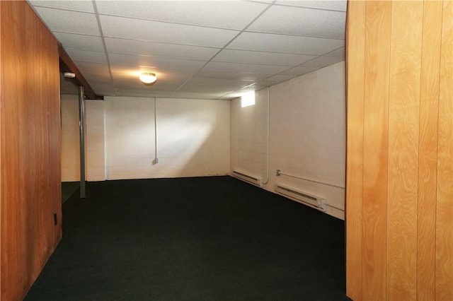 7 Windridge Dr, Uniontown, PA 15401 - finished basement featuring a baseboard radiator and dark colored carpet
