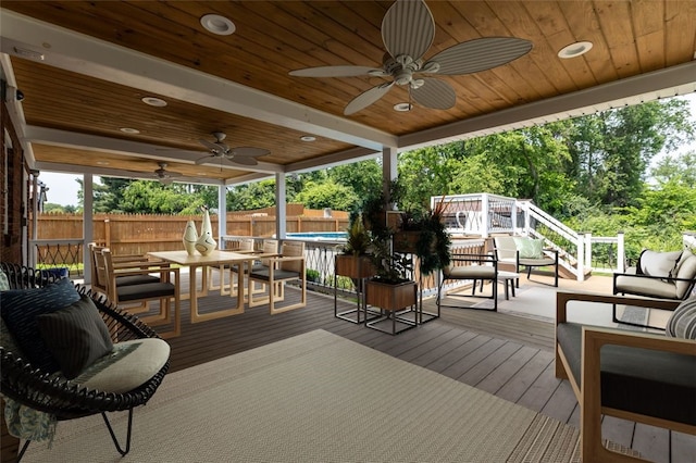 3315 Crestview Dr N, Versailles, PA 15137 - deck featuring a ceiling fan, an outdoor pool, stairs, and outdoor dining area