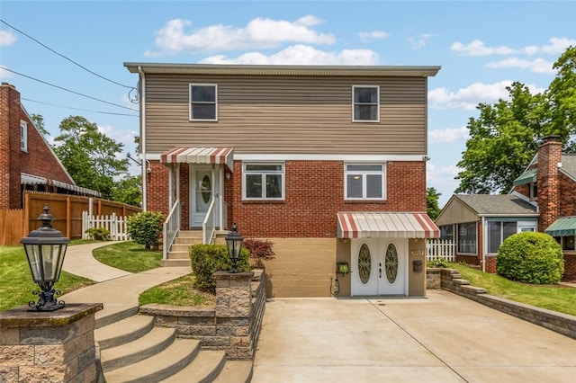 3315 Crestview Dr N, Versailles, PA 15137 - view of front facade with brick siding