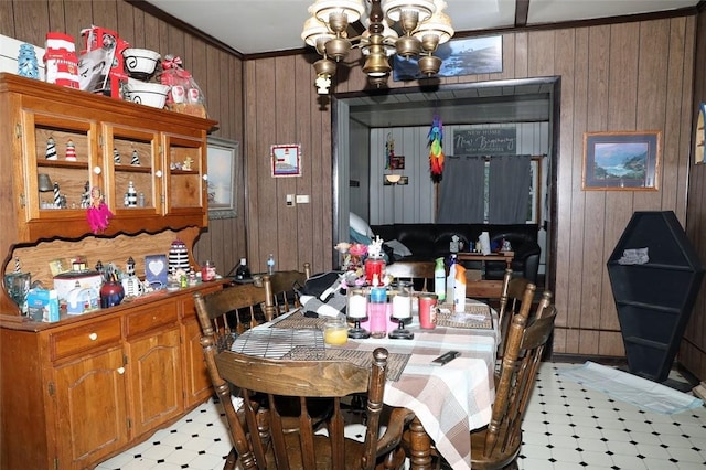 5 Moyer Ave, Scottdale, PA 15683 - dining room with light flooring, a chandelier, wooden walls, and ornamental molding