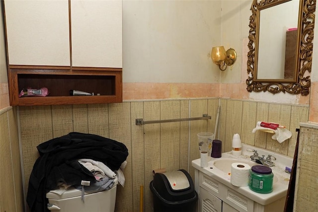 5 Moyer Ave, Scottdale, PA 15683 - half bathroom with toilet, vanity, and wainscoting