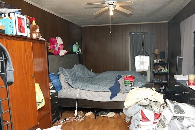 5 Moyer Ave, Scottdale, PA 15683 - bedroom featuring wooden walls, wood finished floors, ornamental molding, and a ceiling fan
