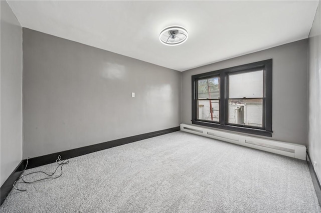 1105 Stieren Ave, Brackenridge, PA 15014 - carpeted spare room with a baseboard radiator and baseboards