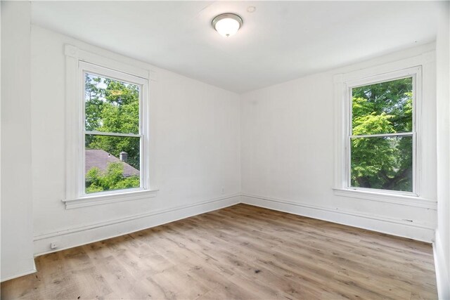 1567 Princeton Blvd, Wilkinsburg, PA 15221 - spare room featuring plenty of natural light, wood finished floors, and baseboards