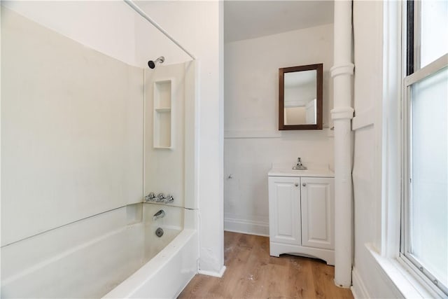 1567 Princeton Blvd, Wilkinsburg, PA 15221 - full bathroom with vanity, shower / bath combination, wood finished floors, and baseboards