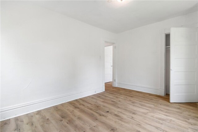 1567 Princeton Blvd, Wilkinsburg, PA 15221 - unfurnished bedroom with wood finished floors, a closet, and baseboards