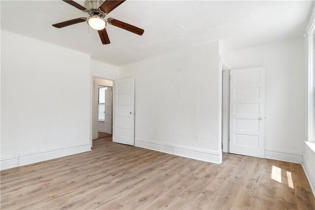 1567 Princeton Blvd, Wilkinsburg, PA 15221 - spare room featuring light wood-style flooring, ceiling fan, and baseboards