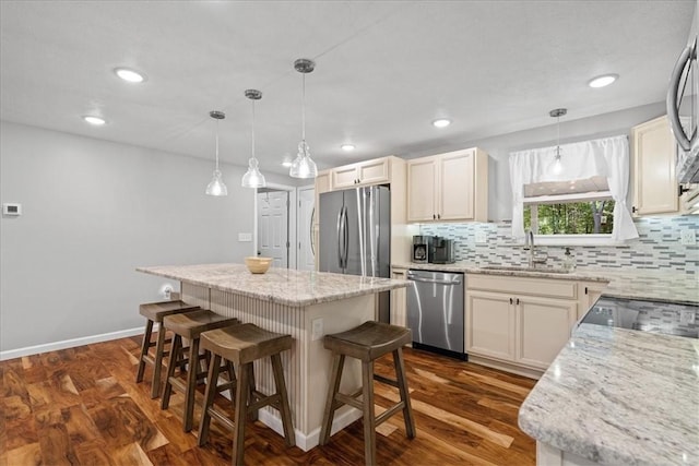 259 Old Blackhawk Rd, Chippewa Twp, PA 15010 - kitchen with stainless steel appliances, a sink, a center island, tasteful backsplash, and recessed lighting