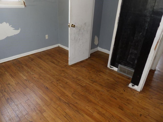 2042 Madison St, Hermitage, PA 16148 - unfurnished bedroom featuring wood-type flooring and baseboards