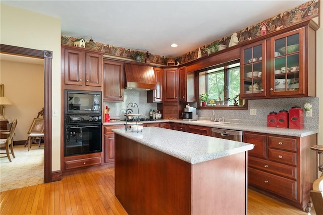 26 Indian Fields Trl, Lower Burrell, PA 15068 - kitchen featuring black appliances, premium range hood, a sink, and light wood finished floors