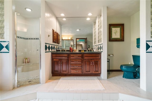 26 Indian Fields Trl, Lower Burrell, PA 15068 - full bathroom featuring toilet, double vanity, a shower stall, and recessed lighting
