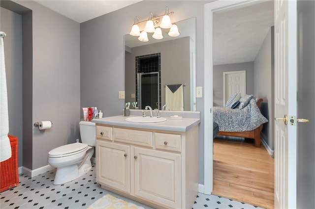 26 Indian Fields Trl, Lower Burrell, PA 15068 - ensuite bathroom with vanity, a shower with door, toilet, and baseboards