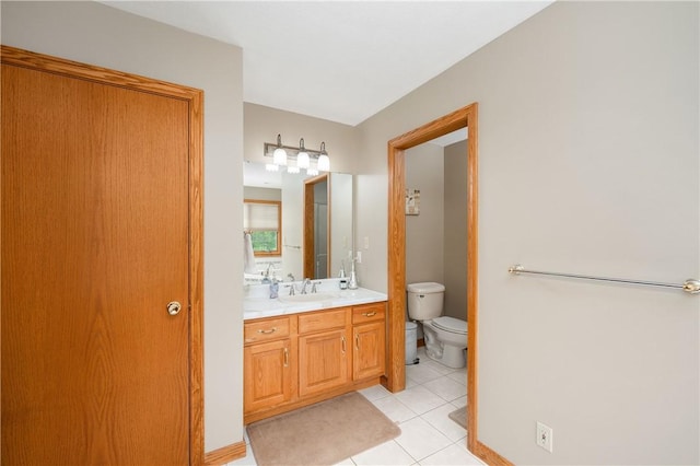 258 Smith Rd, Connoquenessing Twp, PA 16053 - bathroom featuring tile patterned floors, vanity, toilet, and baseboards