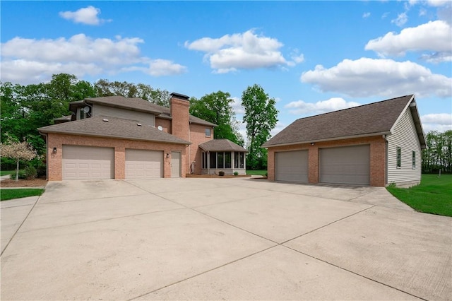 258 Smith Rd, Connoquenessing Twp, PA 16053 - view of front of property with brick siding, a chimney, and a shingled roof