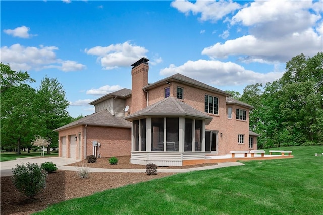 258 Smith Rd, Connoquenessing Twp, PA 16053 - rear view of property with brick siding, a sunroom, a lawn, a chimney, and a garage