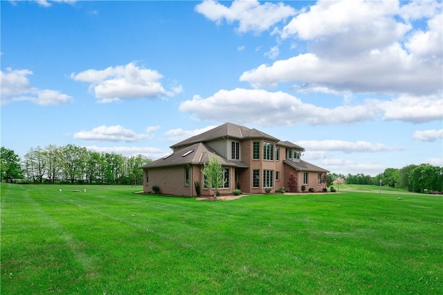 258 Smith Rd, Connoquenessing Twp, PA 16053 - rear view of house featuring a lawn and brick siding