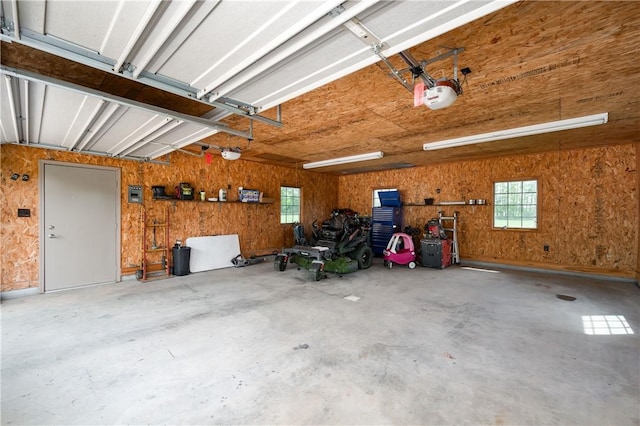 258 Smith Rd, Connoquenessing Twp, PA 16053 - garage featuring a garage door opener