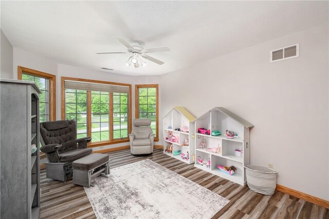 258 Smith Rd, Connoquenessing Twp, PA 16053 - living area with ceiling fan, wood finished floors, and baseboards