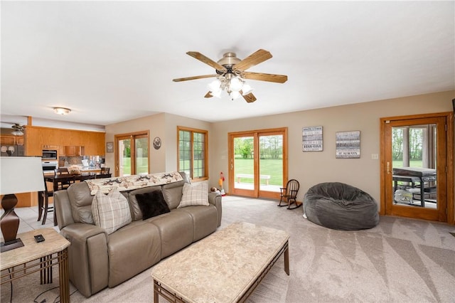 258 Smith Rd, Connoquenessing Twp, PA 16053 - living room with light colored carpet and a ceiling fan