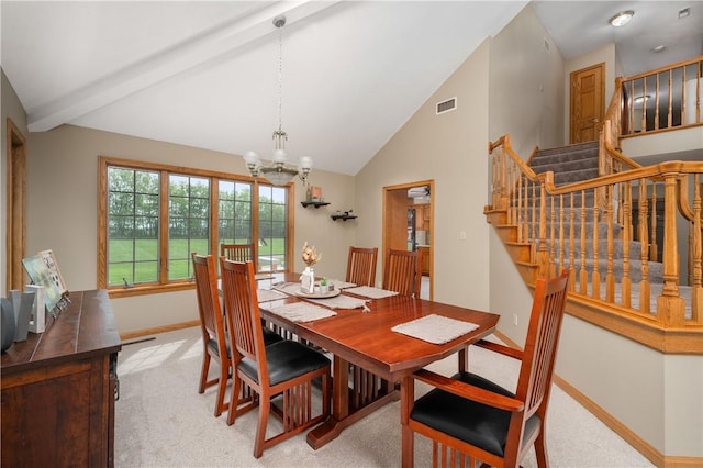 258 Smith Rd, Connoquenessing Twp, PA 16053 - dining space with a chandelier, light colored carpet, baseboards, stairway, and high vaulted ceiling