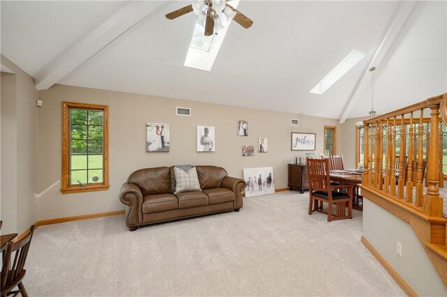 258 Smith Rd, Connoquenessing Twp, PA 16053 - living room featuring a skylight, a ceiling fan, and light carpet